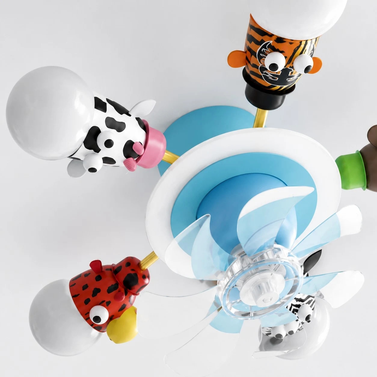 Close view of animal lamp arms and globe shades