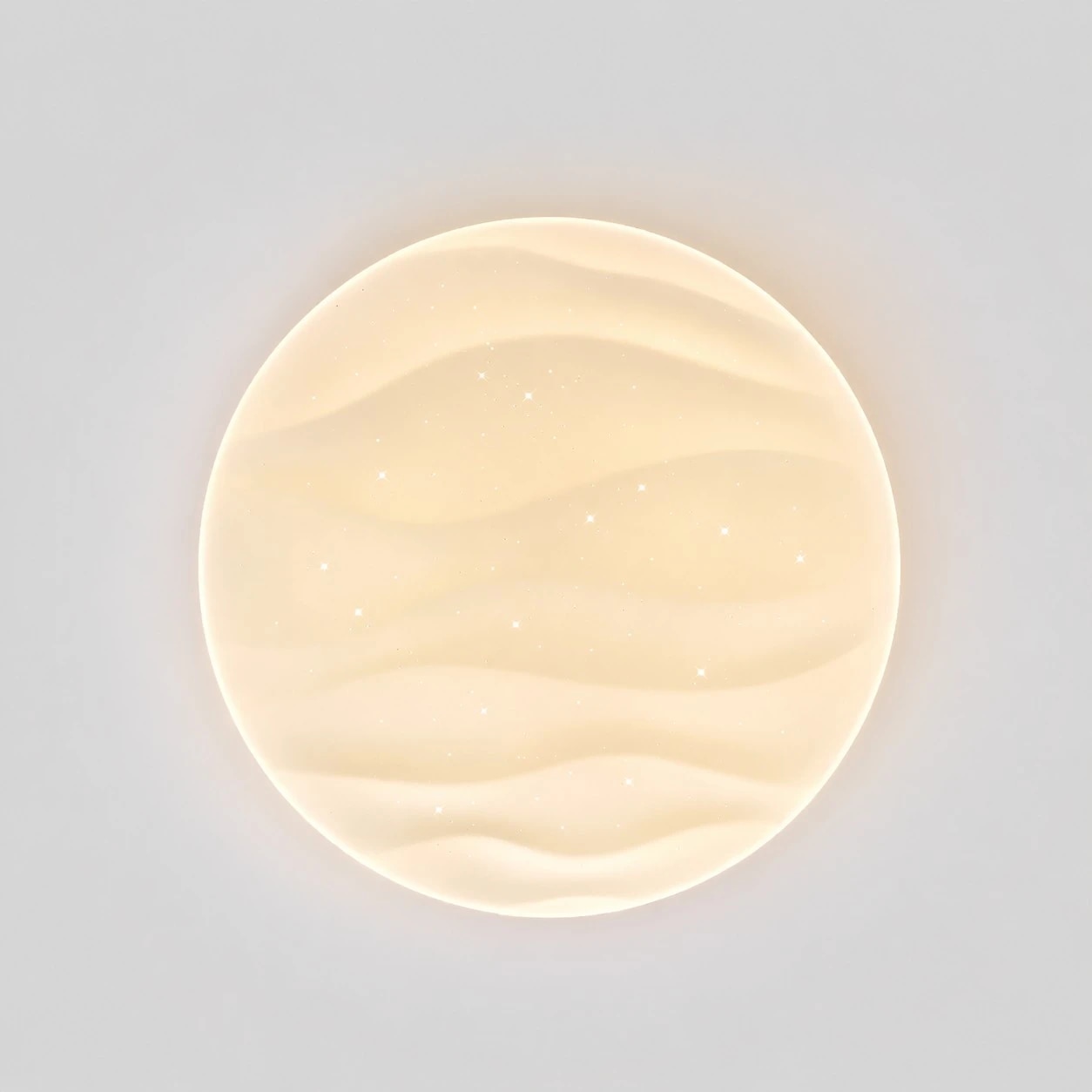Full top view of the warm glowing diffuser