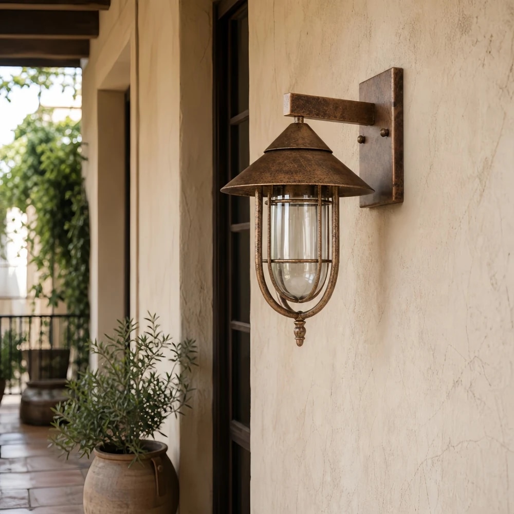 Rust finish wall light on a covered patio wall