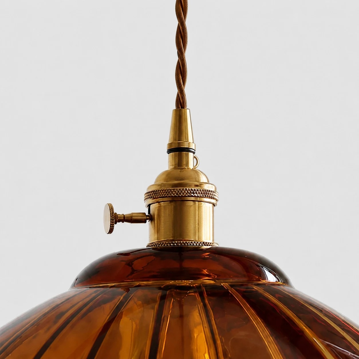 Brass tone suspension hardware