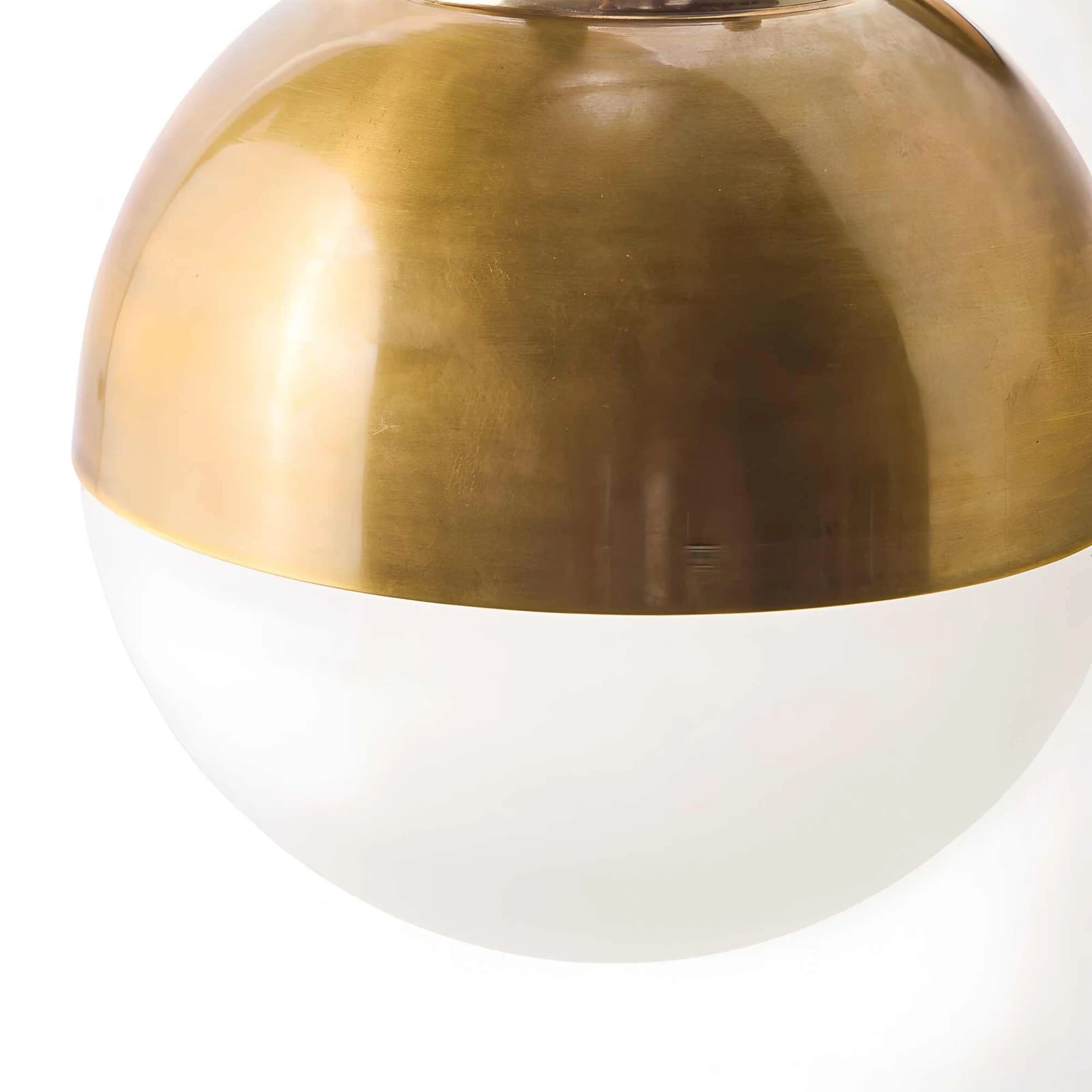 Close-up of the vintage brass shade and soft globe diffuser