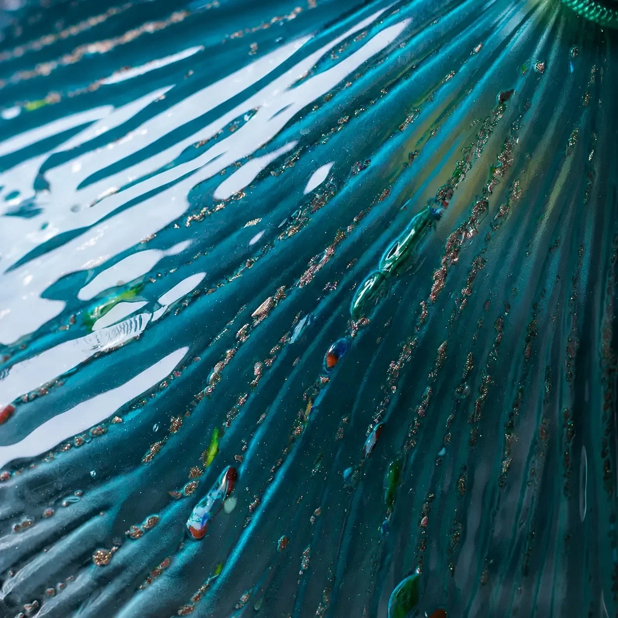 Ribbed blue glass texture close view