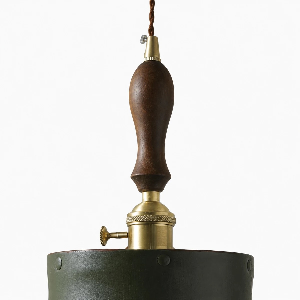 wood handle brass socket and green leather shade close up