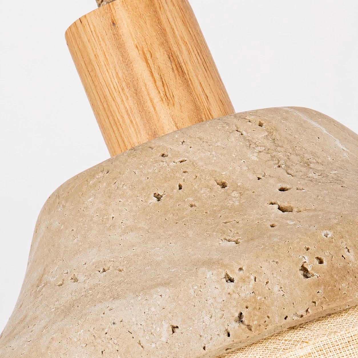 Natural stone cap and wood stem close-up