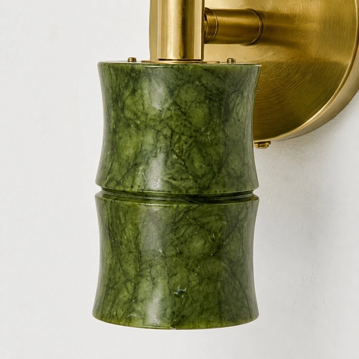 Marbled green finish, bamboo-joint silhouette and brushed brass-tone support.