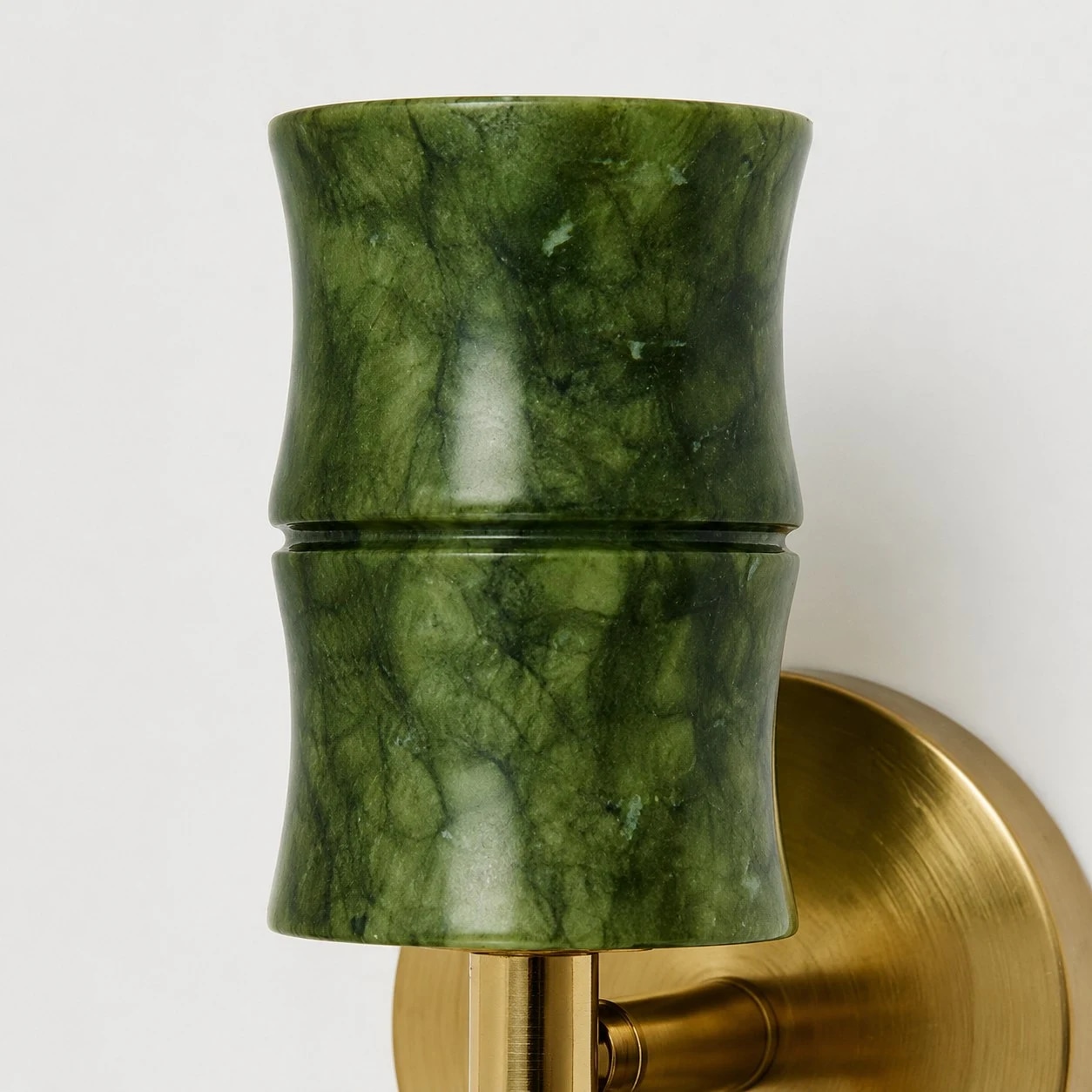 Marbled green finish, bamboo-joint silhouette and brushed brass-tone support.