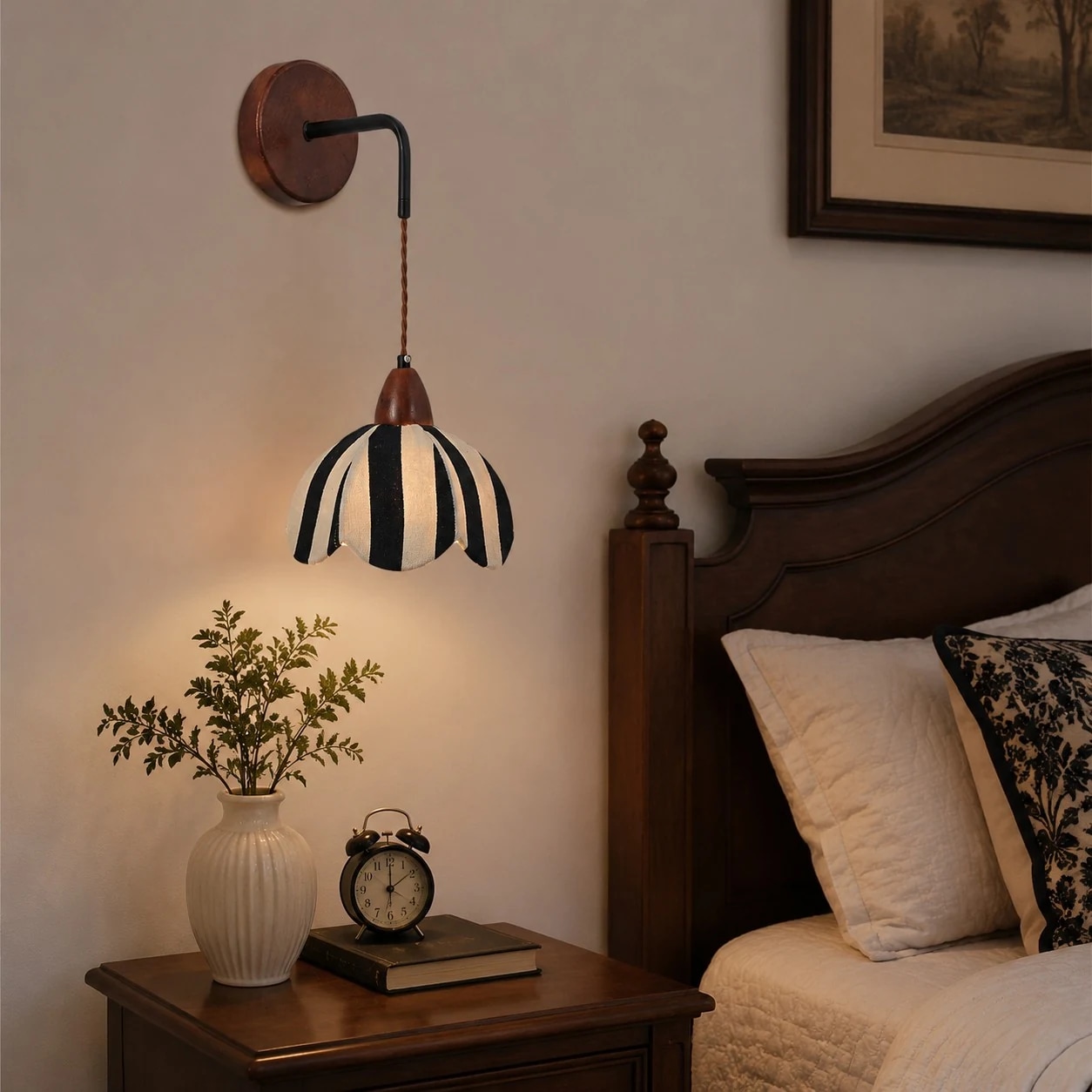 Striped fabric wall lamp installed beside a bedroom nightstand