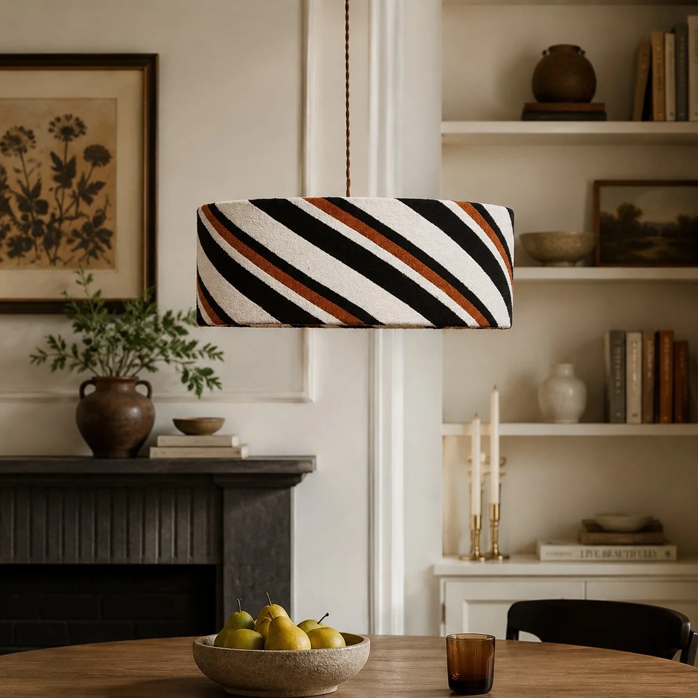 Striped pendant light in a warm dining room