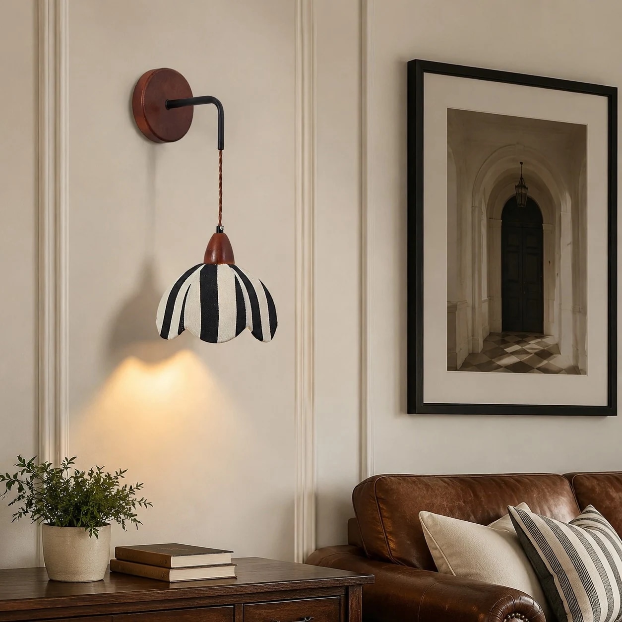 Striped fabric wall lamp styled on a bedside art wall