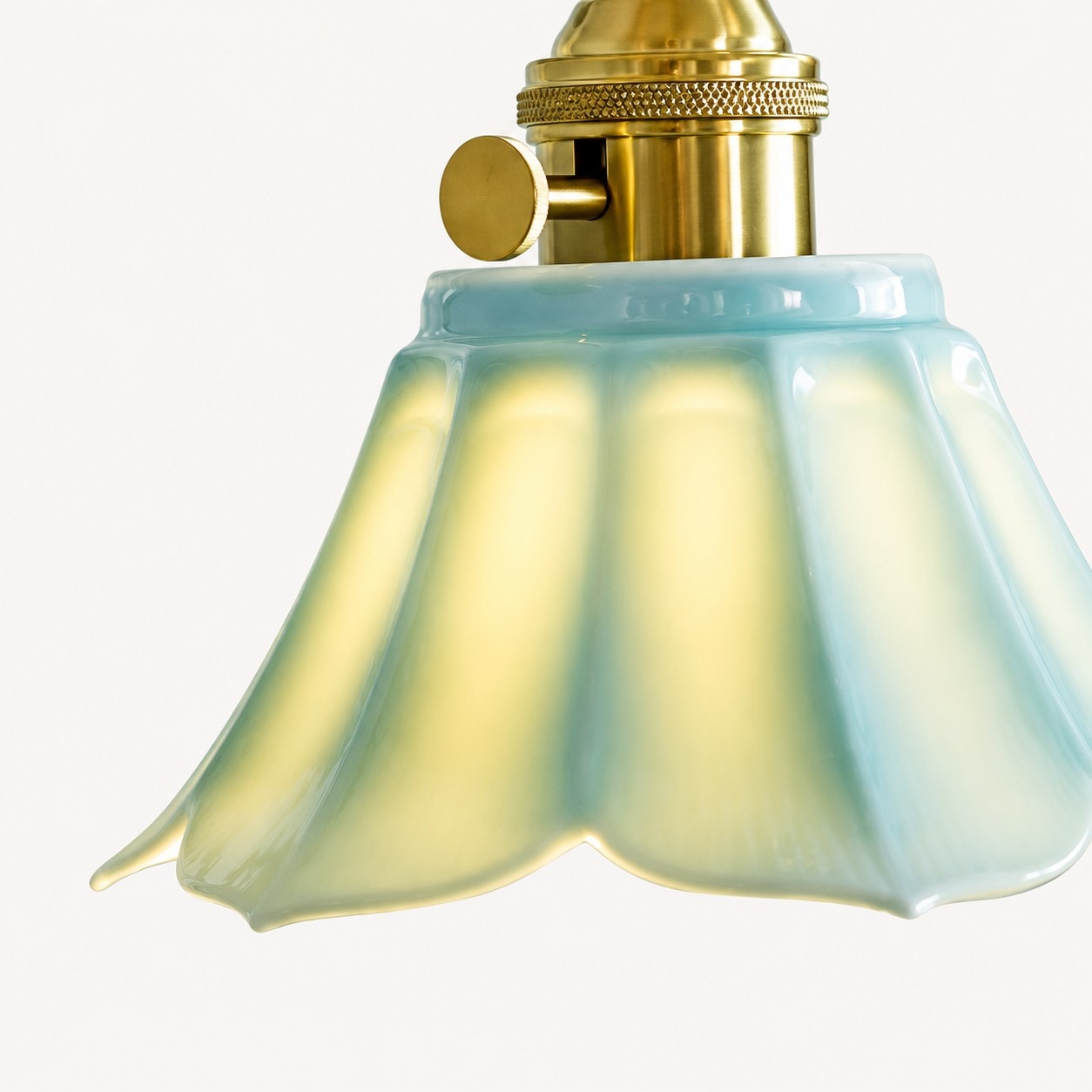 Illuminated glazed ceramic shade detail