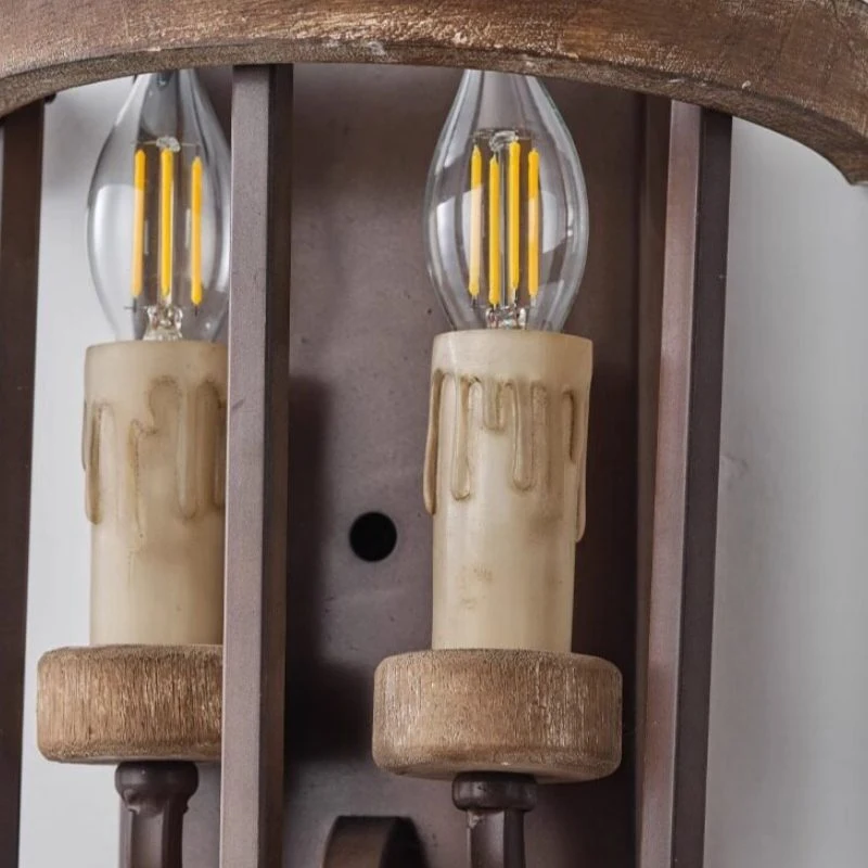 Candle-style holders and vertical iron frame detail
