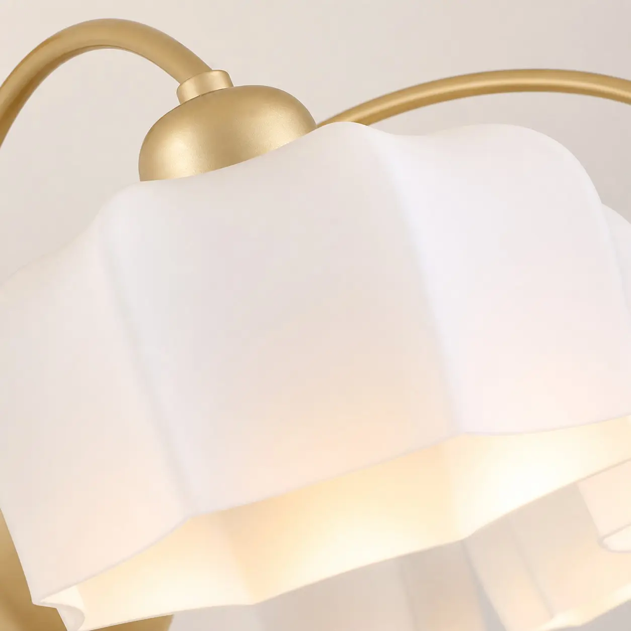 Close-up of the sculpted white glass shade
