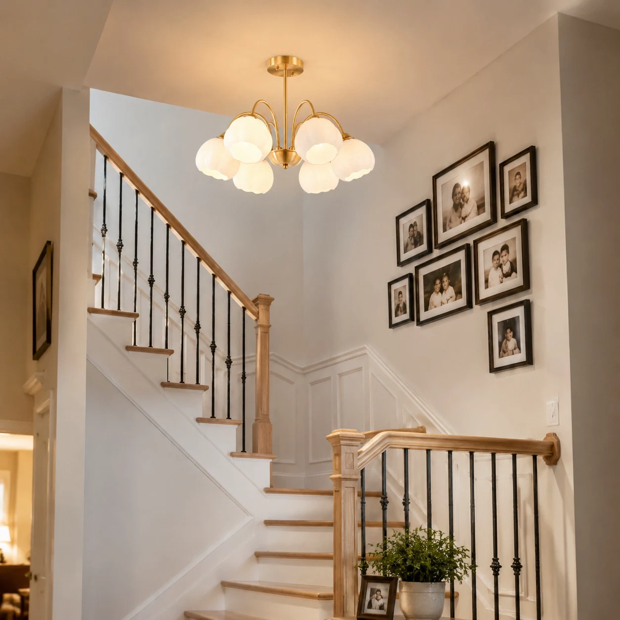 Chandelier installed above a staircase