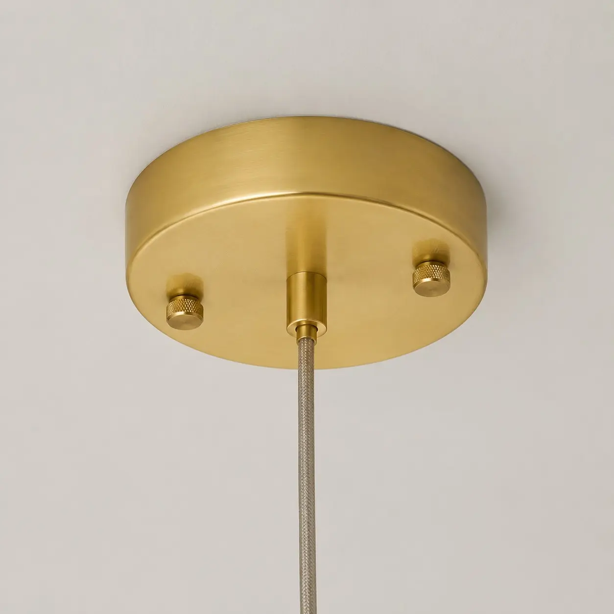Close-up of the brass-toned ceiling canopy