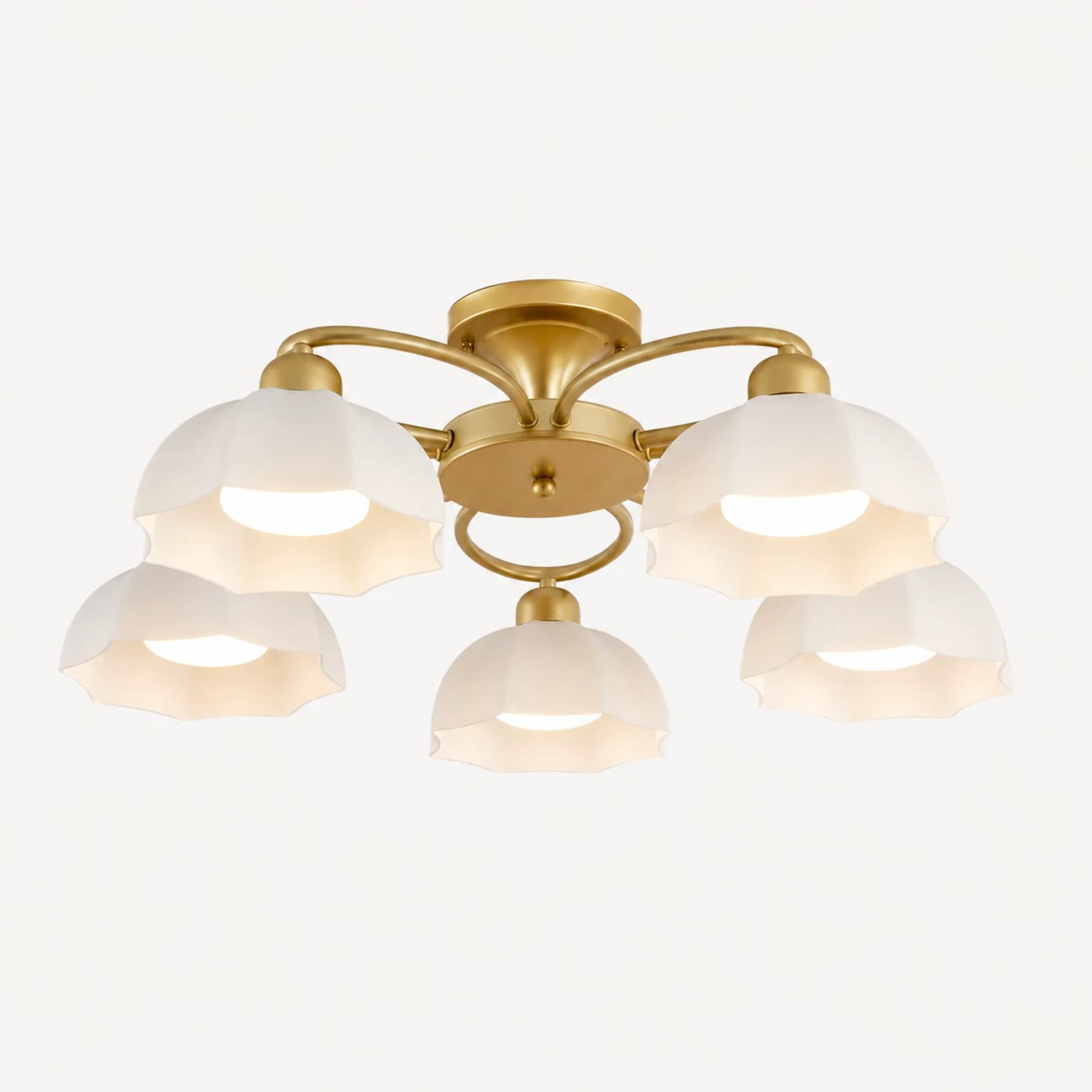 Five-light brass-tone ceiling fixture with white glass shades