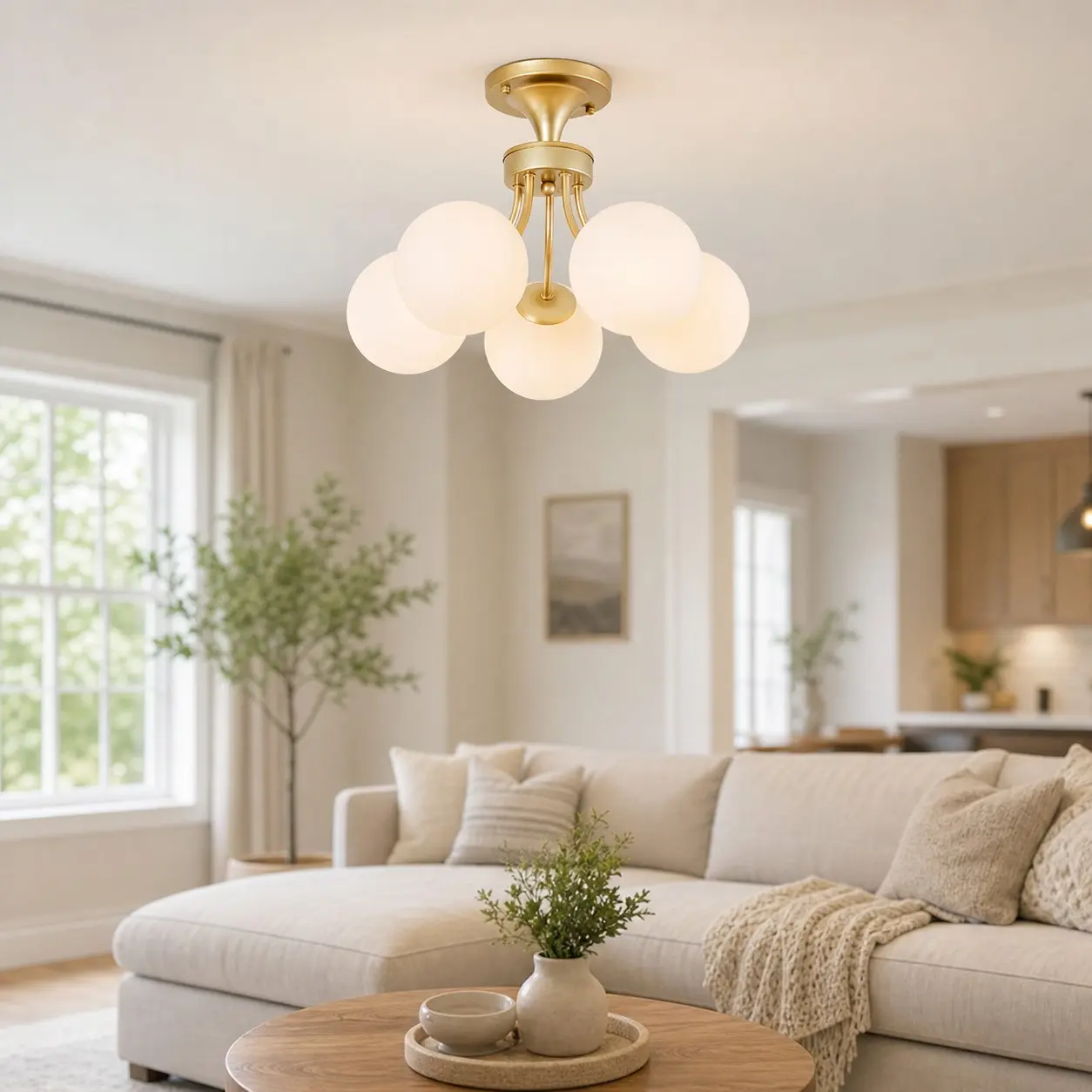 Gold globe ceiling light styled in a bright modern living room