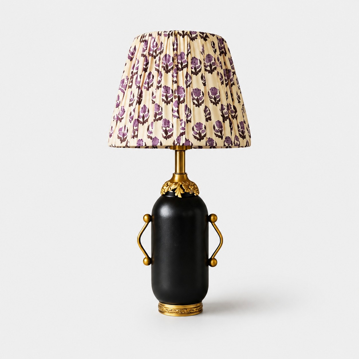 Matte black table lamp with purple floral pleated shade