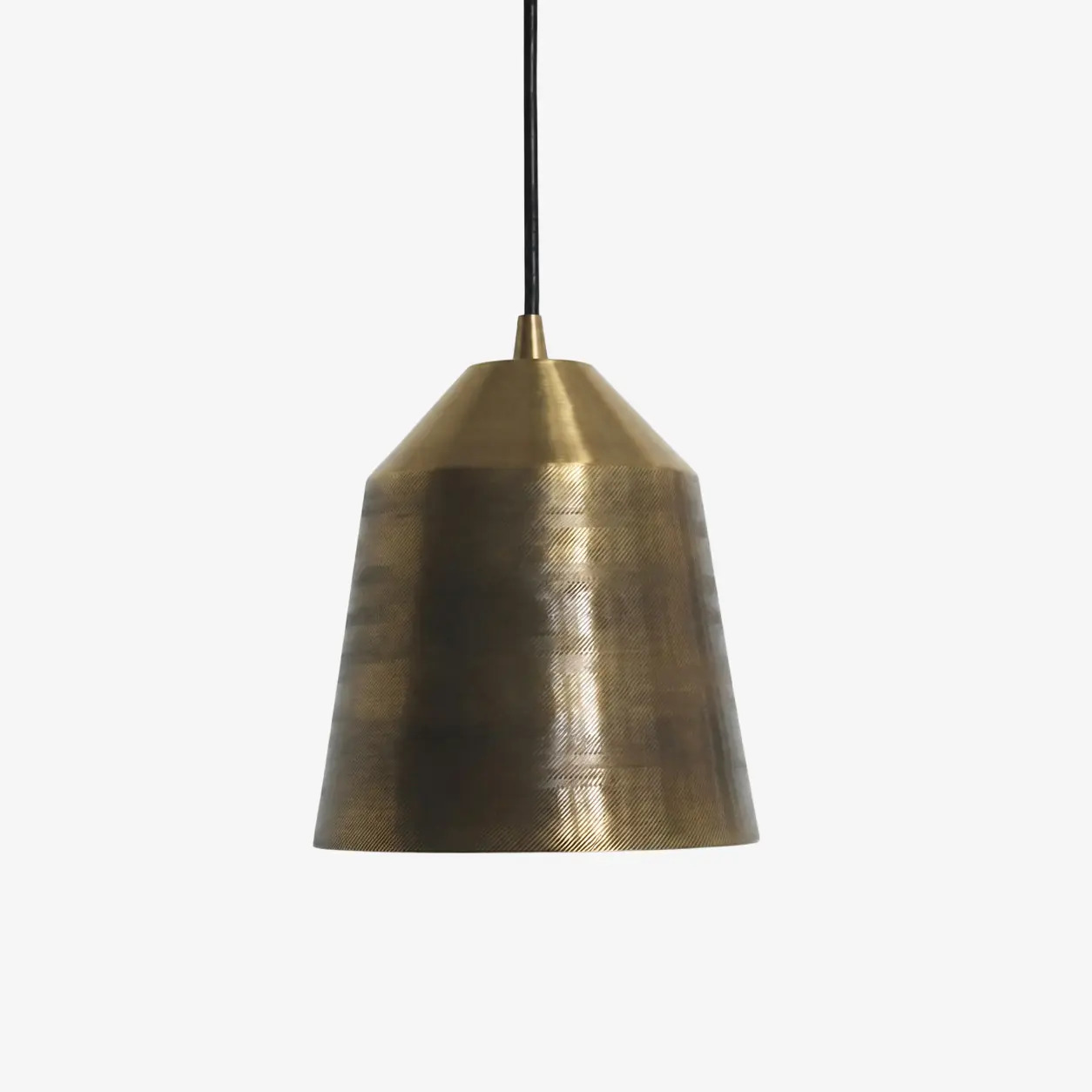 Hand-carved brass pendant lamp on a clean background