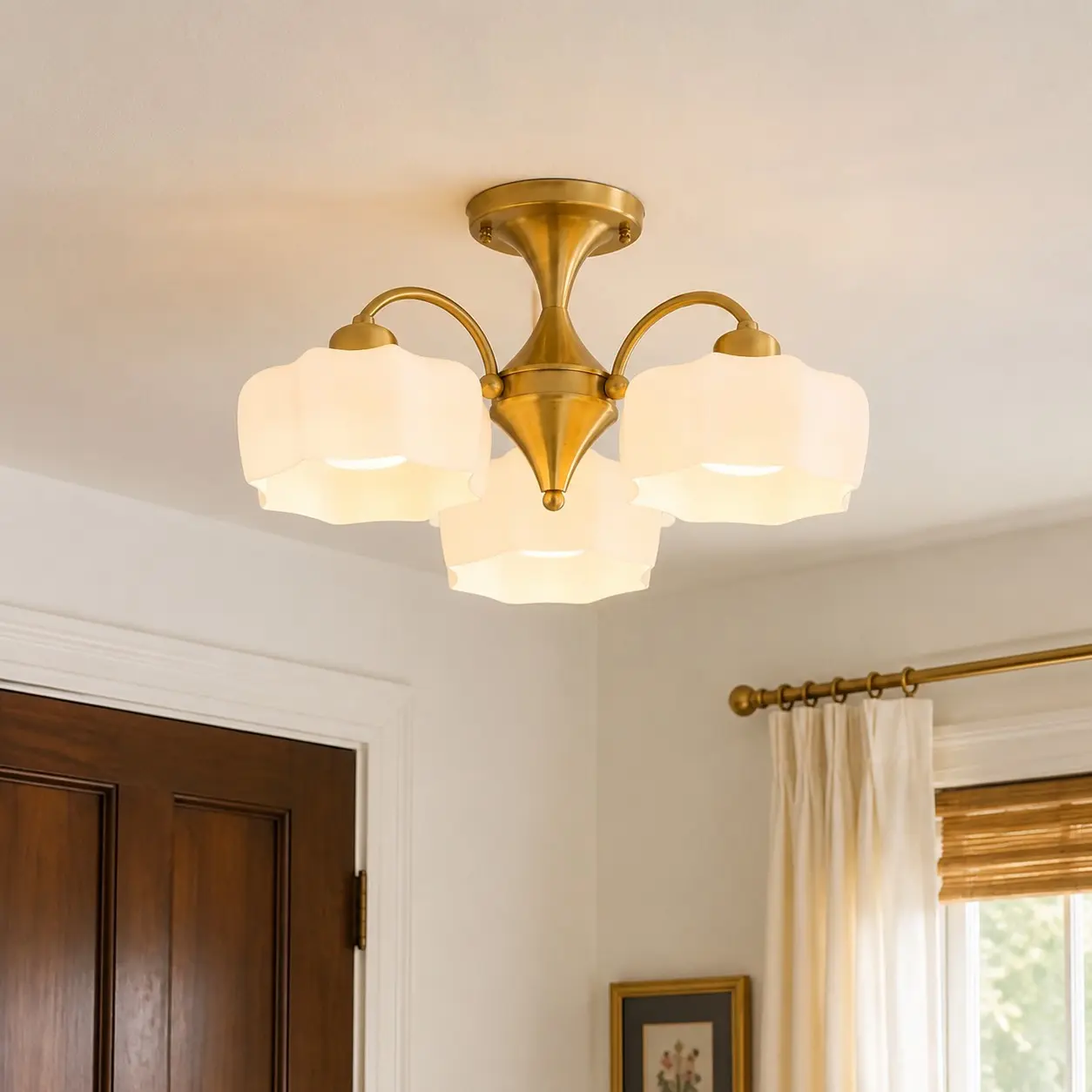 Brushed gold and white glass ceiling light in a warm entryway