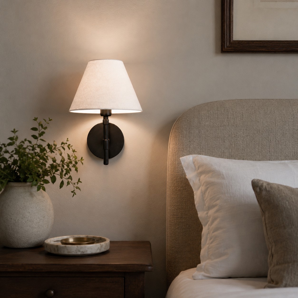 Fabric shade wall sconce with black iron frame