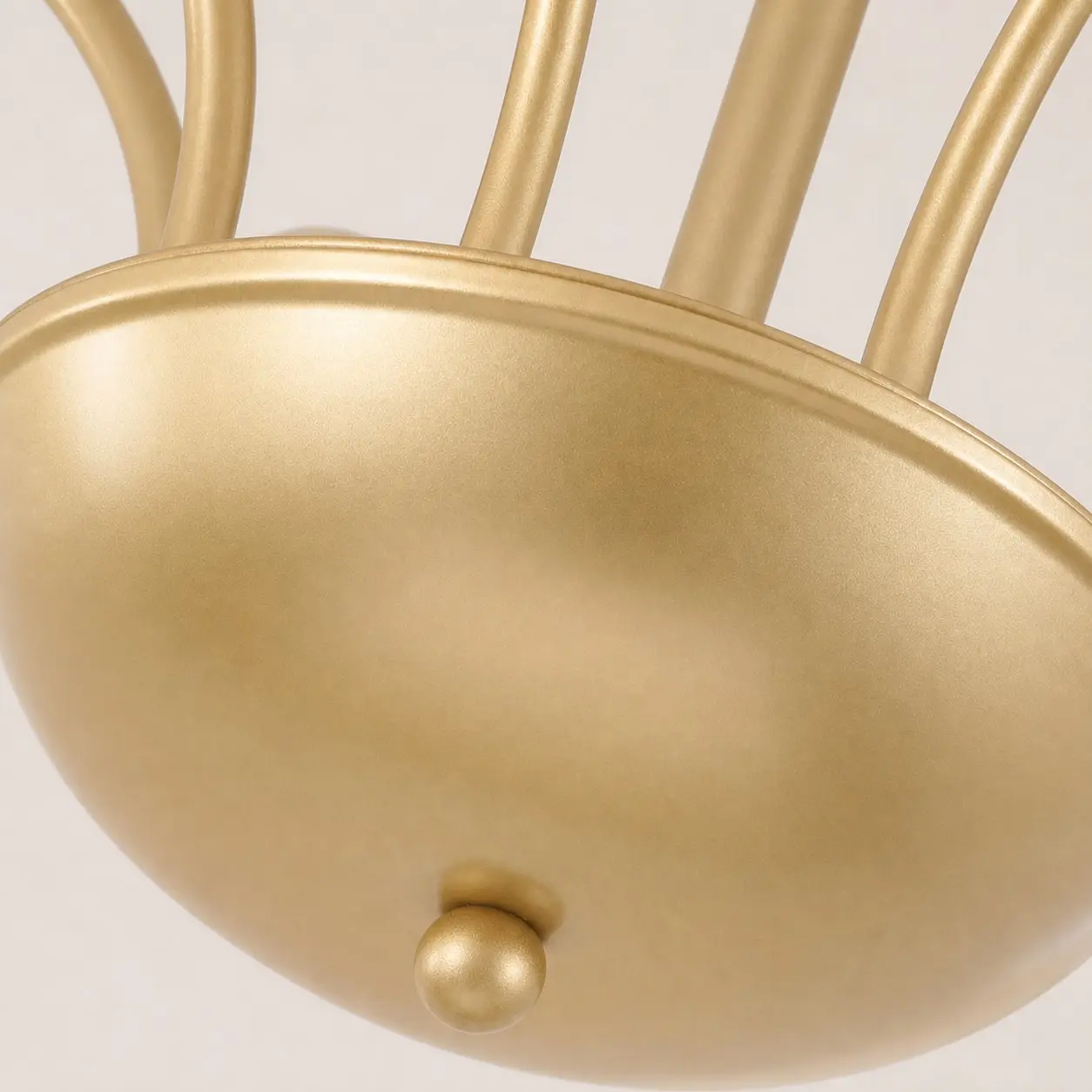 Close-up of the satin gold metal finish