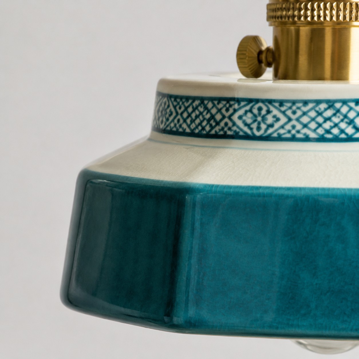 Glazed ceramic shade and patterned rim detail