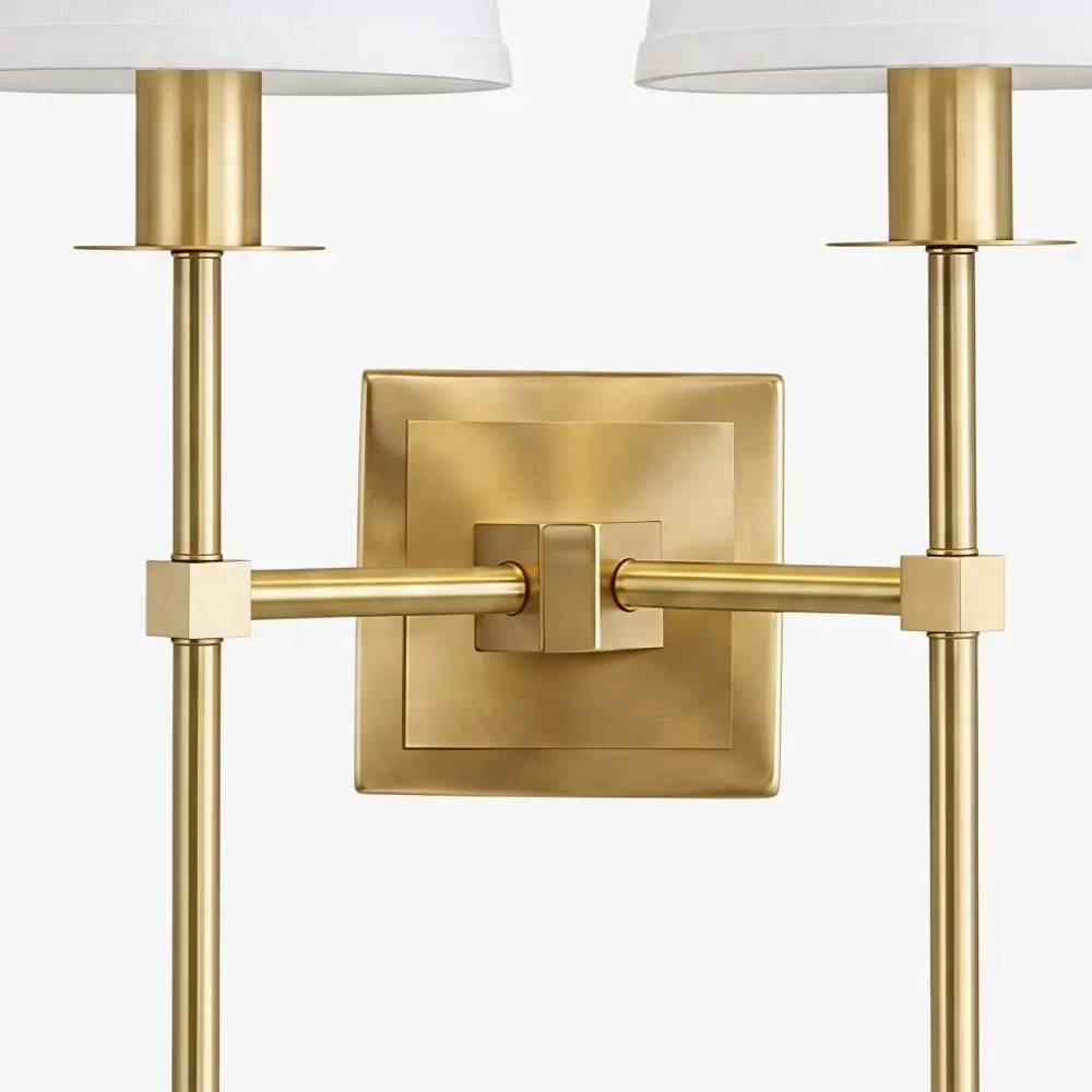 Close-up of the double-head brass arm connection