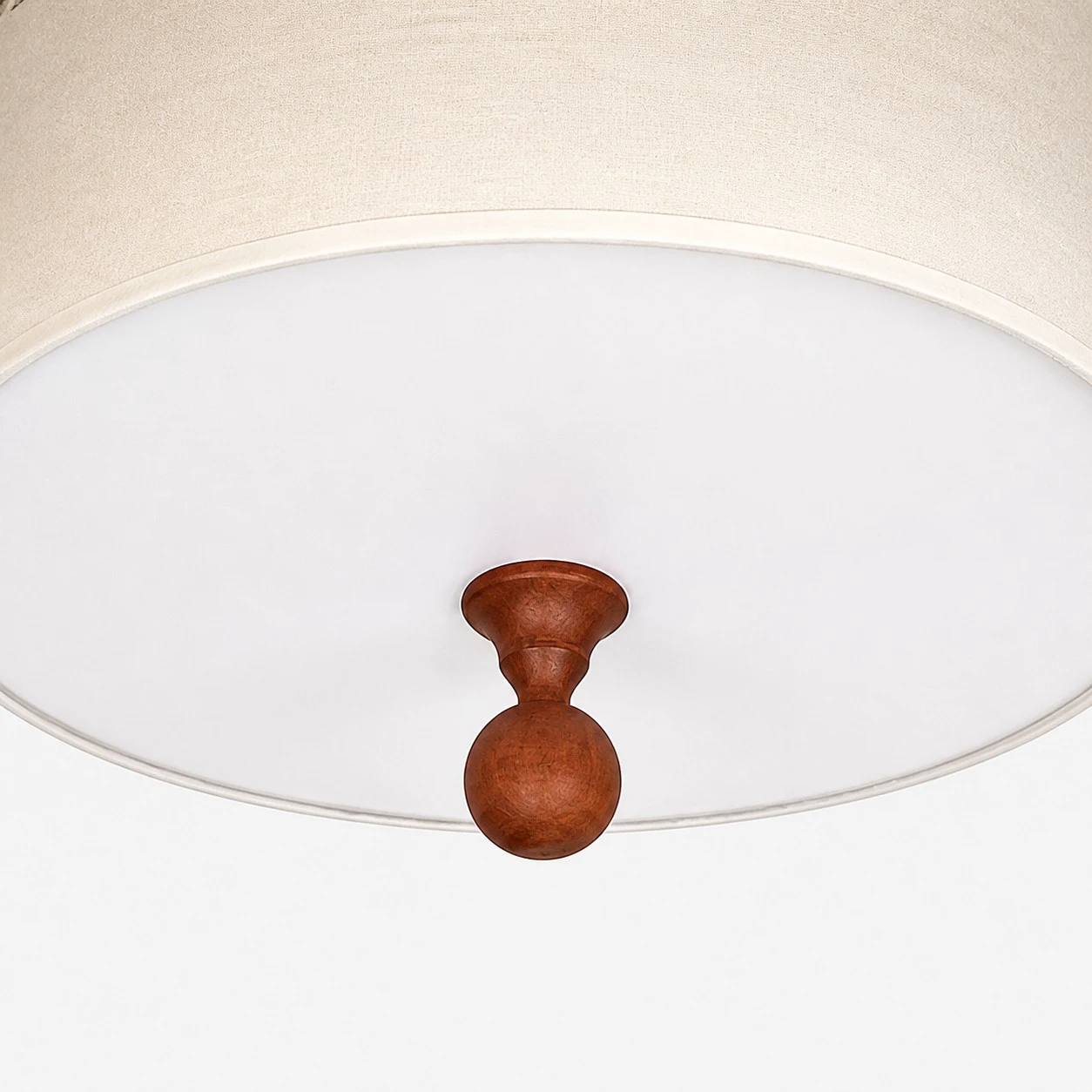 Detailopname van de houten sierknop en de zachte diffuser.