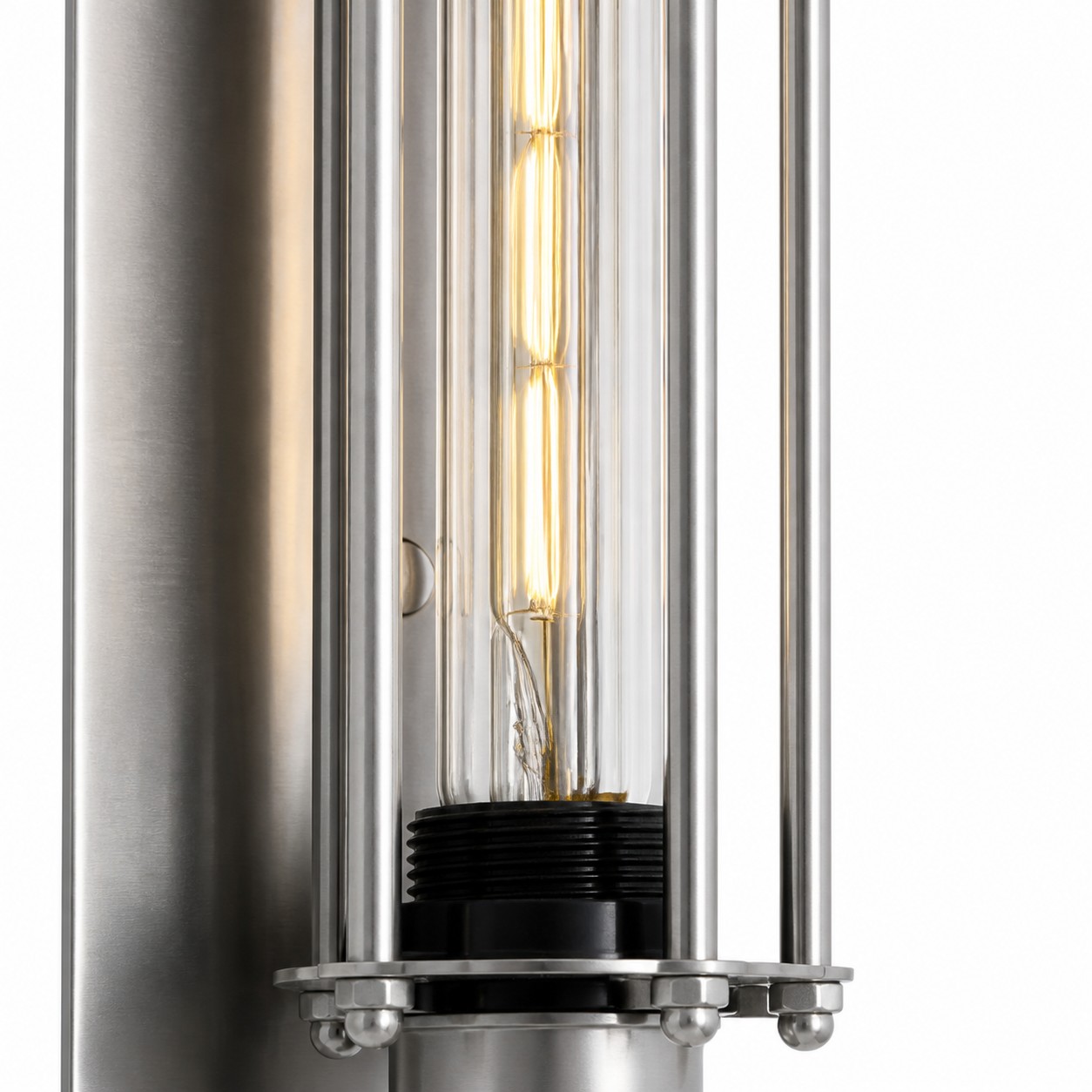 Glass tube held within the metal frame