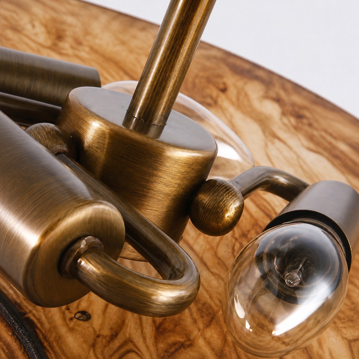 Antique brass center fitting and curved arms