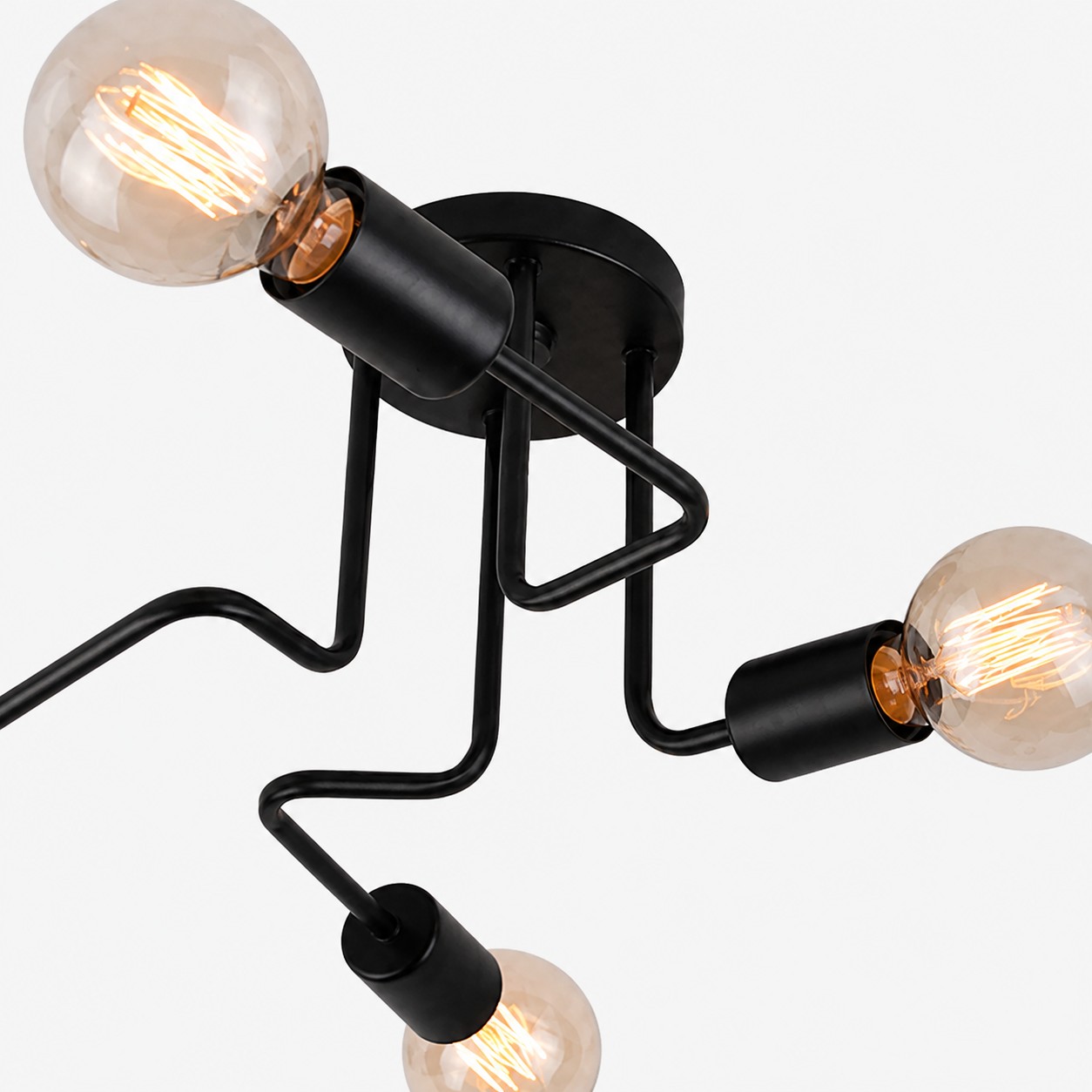 Angled arms and exposed bulb bases