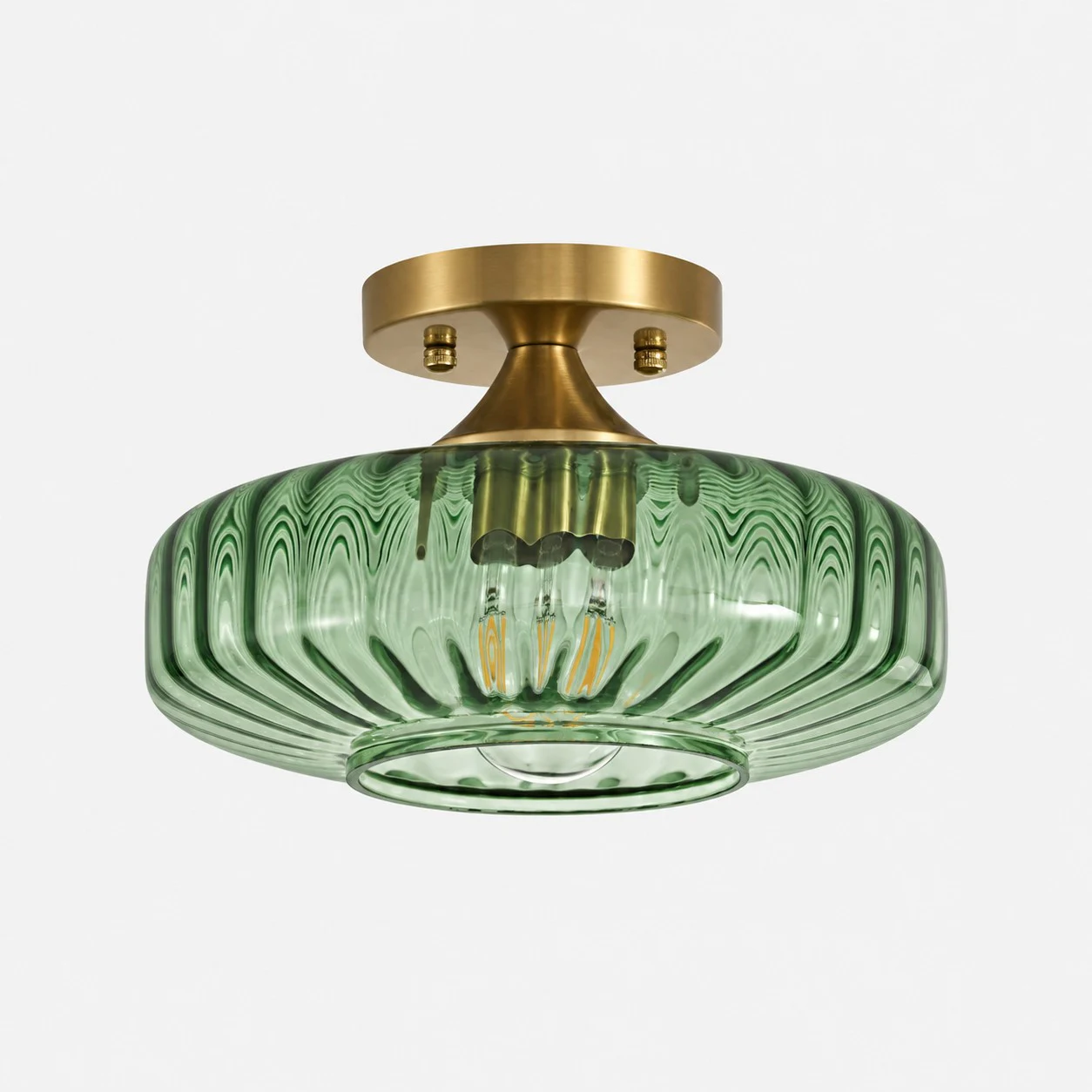 Green ribbed glass semi-flush ceiling light with brushed brass canopy